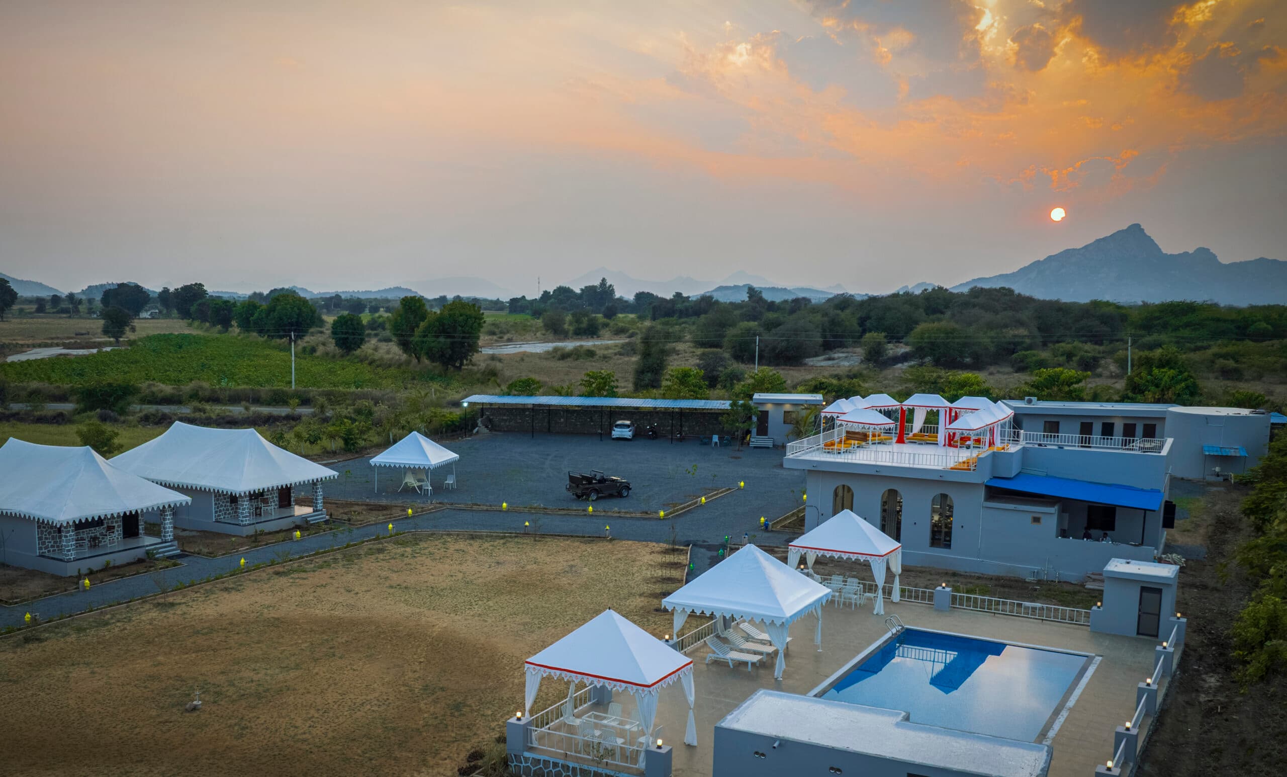 Upvan Jawai from the air at sunset, the hills of Jawai on the horizon